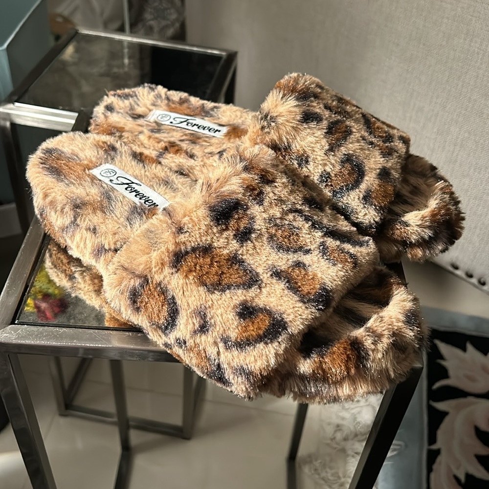 Forever like new leopard faux furry slippers.  Very cozy - 7.5